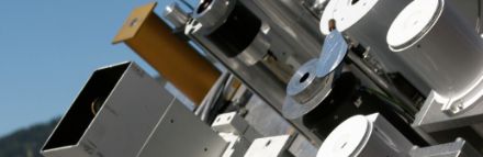 Metal plate on the top of which dozens of metal cylinders with small openings are mounted.