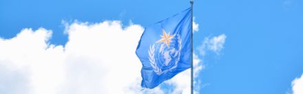 The WMO flag on top of the WMO headquarters in Geneva.