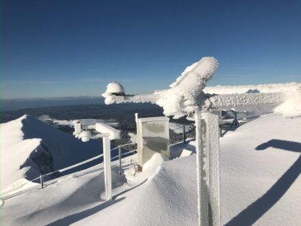 Photo of weather station covered in ice and snow.