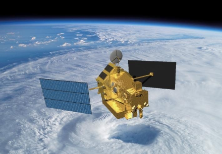 Earth observation satellite over a tropical cyclone.